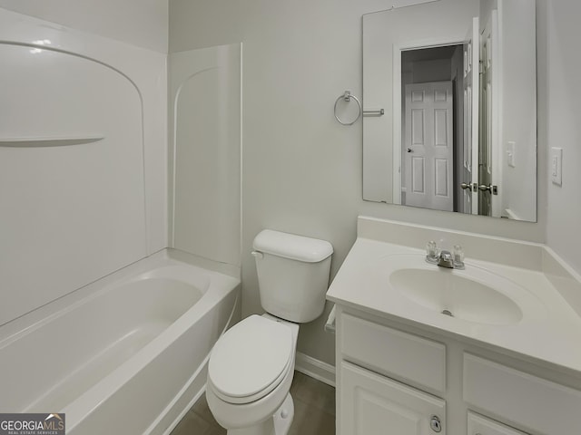 full bathroom featuring vanity, bathtub / shower combination, and toilet