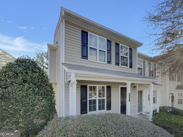 view of property featuring a porch