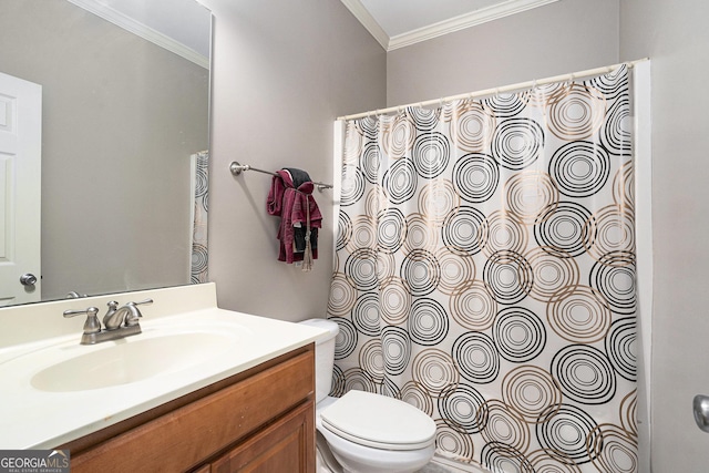 bathroom featuring ornamental molding, toilet, and vanity