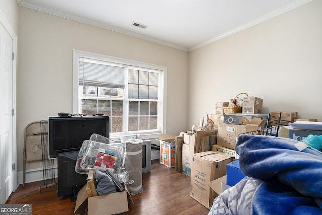 interior space with dark wood-type flooring and crown molding