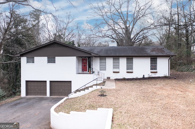 ranch-style home with a garage