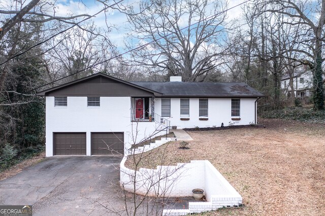 view of front of home featuring a garage