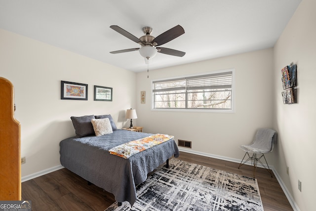 bedroom with hardwood / wood-style flooring and ceiling fan