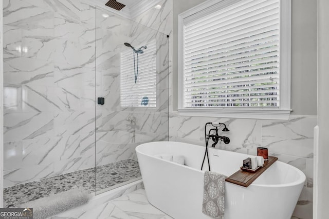 bathroom with shower with separate bathtub