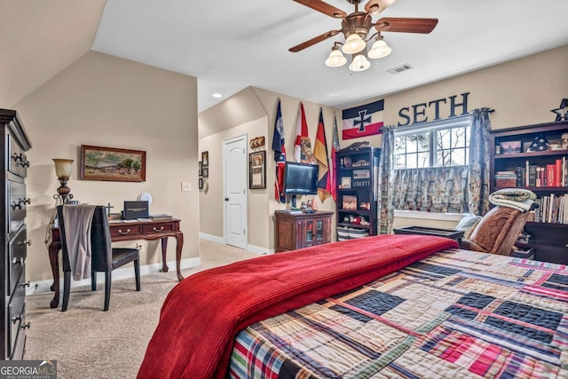 carpeted bedroom with lofted ceiling and ceiling fan