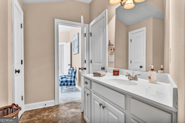 bathroom featuring tile patterned floors and vanity