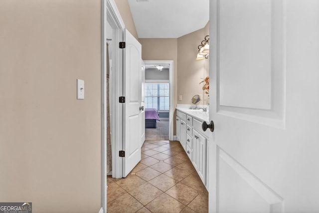 bathroom with vanity and tile patterned floors