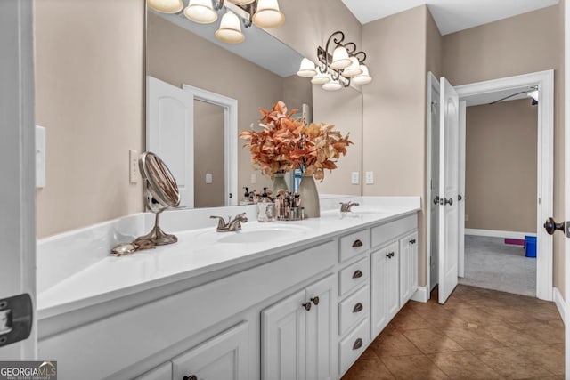 bathroom with vanity and tile patterned floors