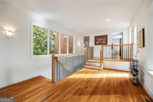 corridor featuring hardwood / wood-style flooring