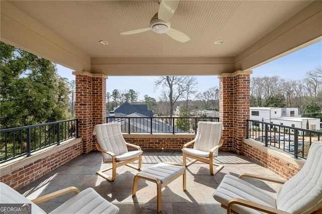 balcony featuring ceiling fan