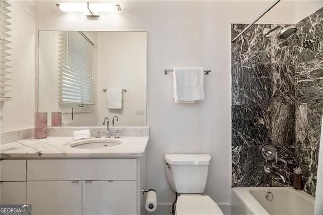 full bathroom with vanity, bathtub / shower combination, and toilet