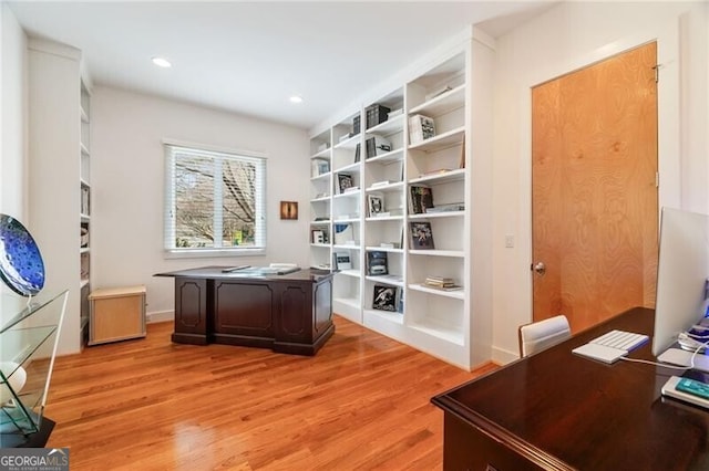 office area with light hardwood / wood-style flooring