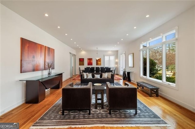 living room with light hardwood / wood-style floors