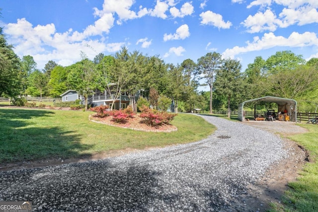 view of property's community featuring a lawn