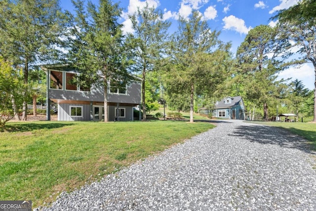 bi-level home with a front yard