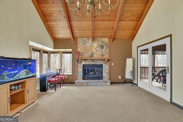 living room featuring beam ceiling, a stone fireplace, light carpet, and high vaulted ceiling