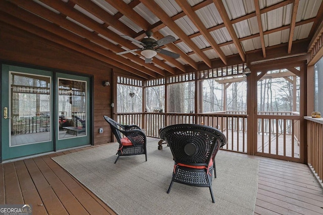 sunroom / solarium featuring vaulted ceiling and ceiling fan