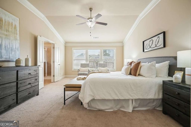 bedroom featuring lofted ceiling, crown molding, light colored carpet, and ceiling fan