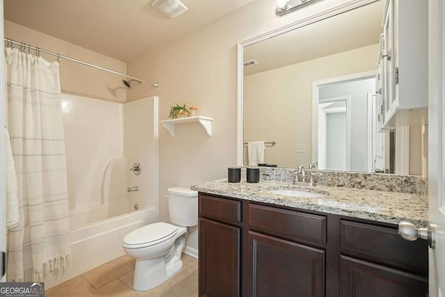 full bathroom with vanity, shower / bathtub combination with curtain, tile patterned floors, and toilet