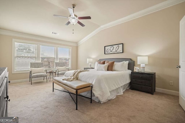 bedroom featuring lofted ceiling, crown molding, light colored carpet, and ceiling fan