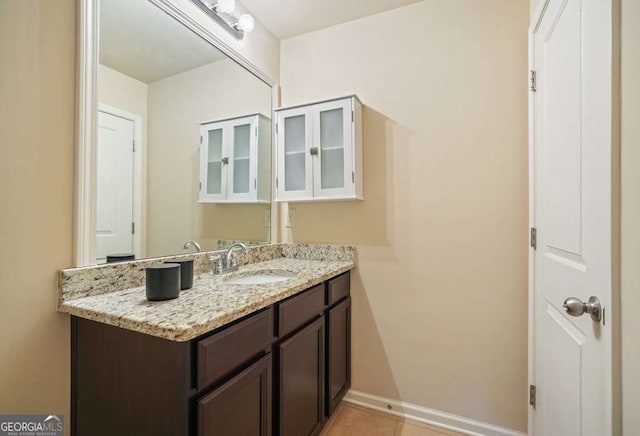 bathroom with vanity and tile patterned floors