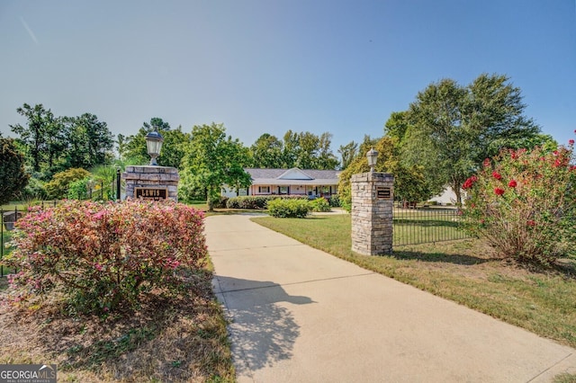 surrounding community featuring a lawn