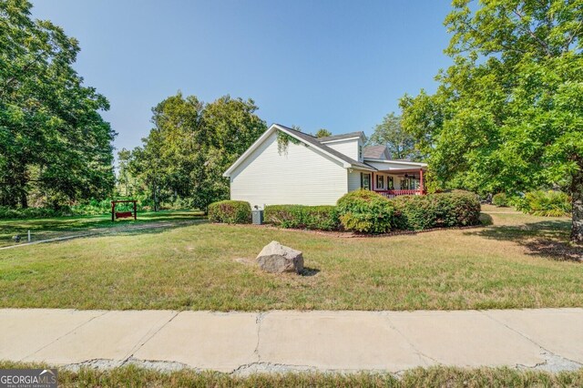 exterior space featuring a yard