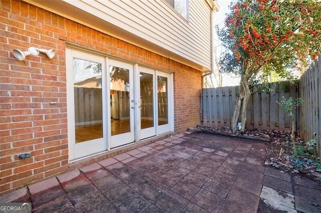 view of patio featuring french doors