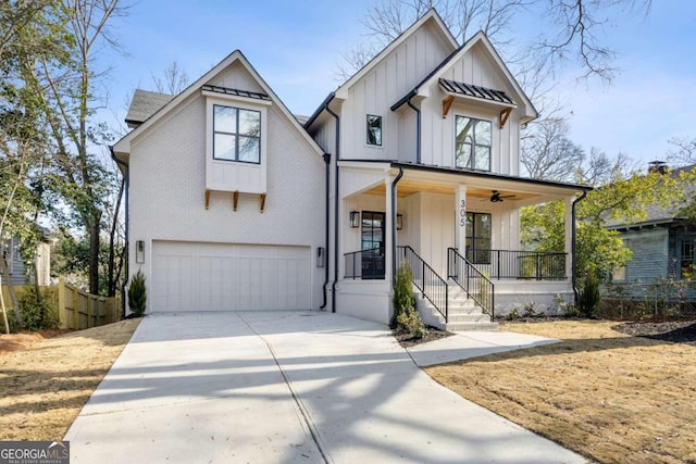 view of front facade with a porch and a garage