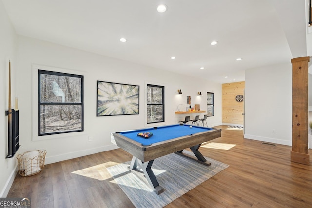 rec room featuring pool table, light hardwood / wood-style floors, and decorative columns