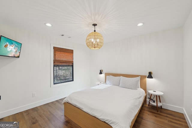 bedroom featuring hardwood / wood-style flooring