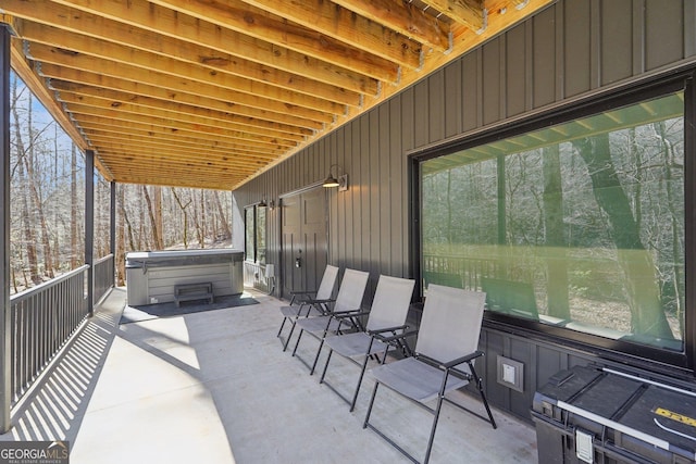 view of patio with a hot tub