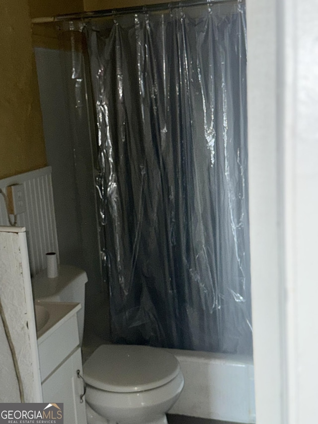 full bathroom featuring vanity, toilet, and shower / tub combo