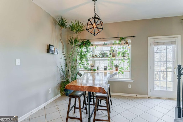 dining room with light tile patterned floors