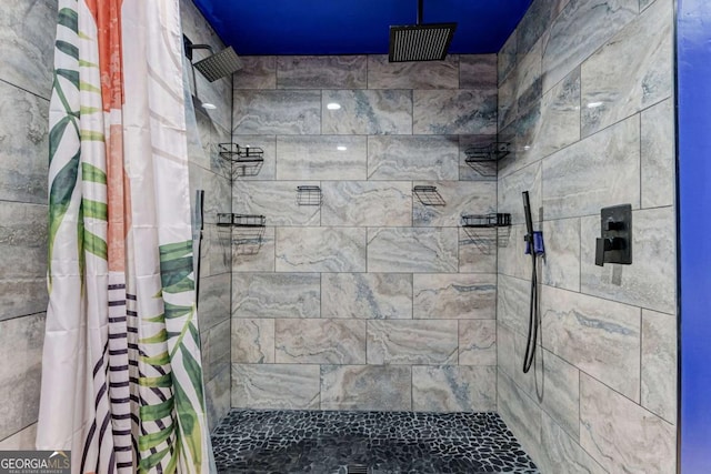 bathroom featuring a shower with curtain