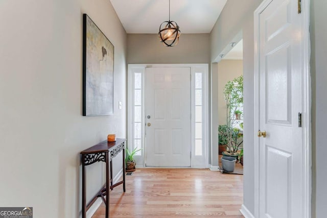 entrance foyer with light hardwood / wood-style floors