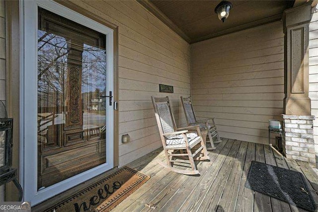 wooden deck featuring a porch