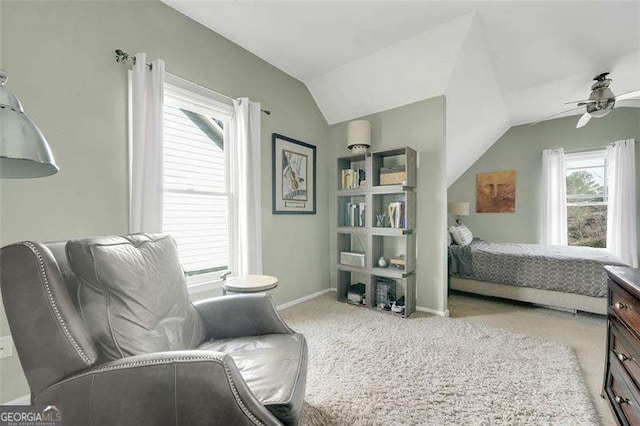 carpeted bedroom featuring vaulted ceiling