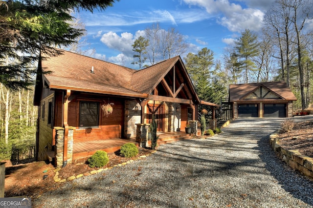 view of front of home featuring a garage and covered porch