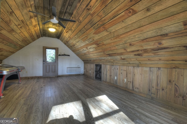 bonus room with wood ceiling, dark wood-type flooring, ceiling fan, and vaulted ceiling