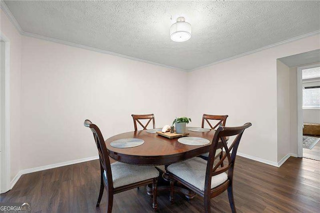 dining space featuring crown molding, dark hardwood / wood-style floors, and a textured ceiling