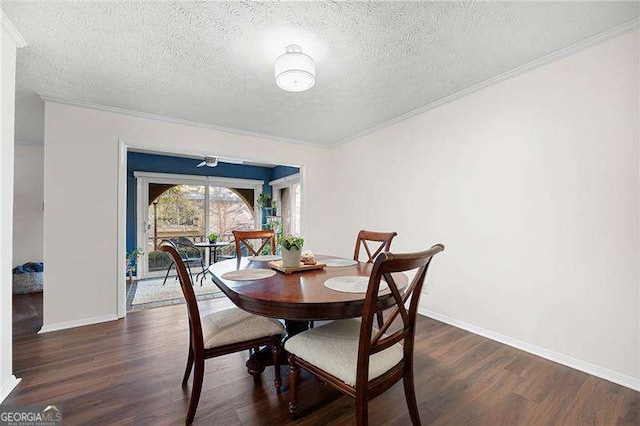 dining room with crown molding, a textured ceiling, and dark hardwood / wood-style flooring