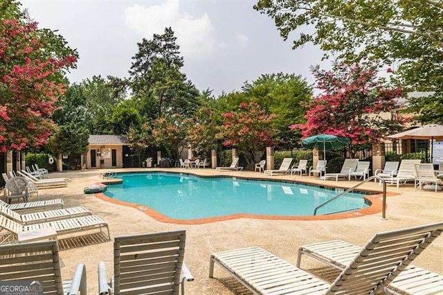 view of pool with a patio area