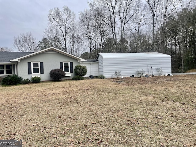 view of property exterior featuring a yard