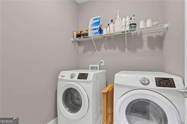 laundry room featuring independent washer and dryer