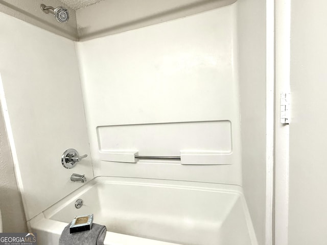 bathroom featuring shower / washtub combination