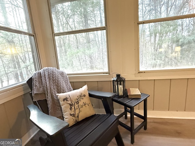 sitting room featuring wood-type flooring