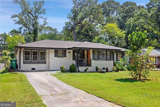 ranch-style home featuring a front yard