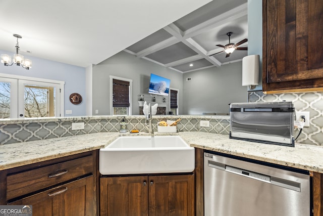 kitchen with sink, dishwasher, coffered ceiling, tasteful backsplash, and light stone countertops