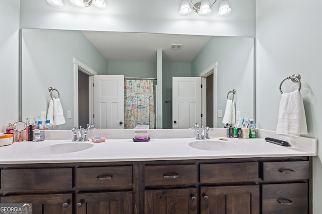 bathroom featuring vanity and walk in shower